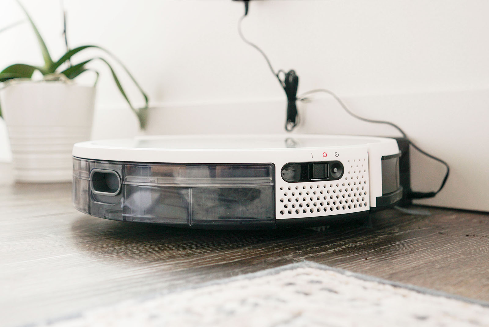 Yeedi K650 vacuum review docked by the wall